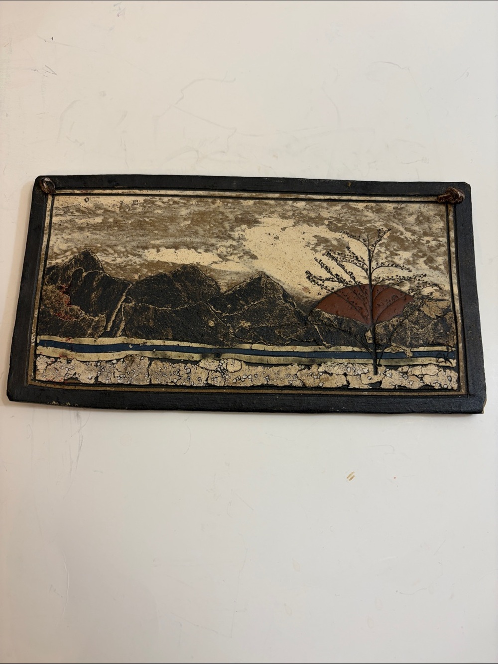 Vintage handmade art work resembles landscape